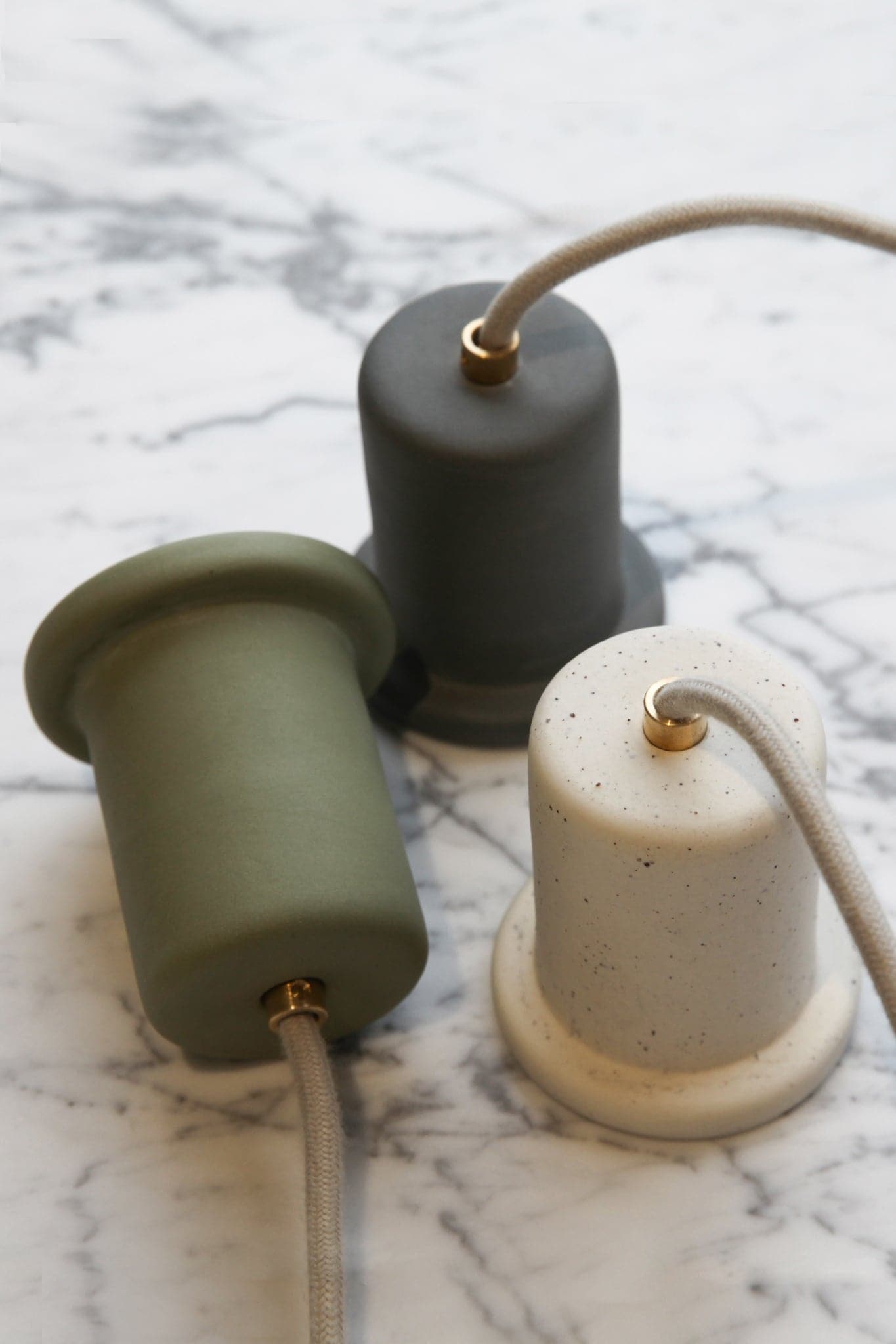 Marz Designs Feature Lighting - Lune Pendant Light details on ceramic fixtures.