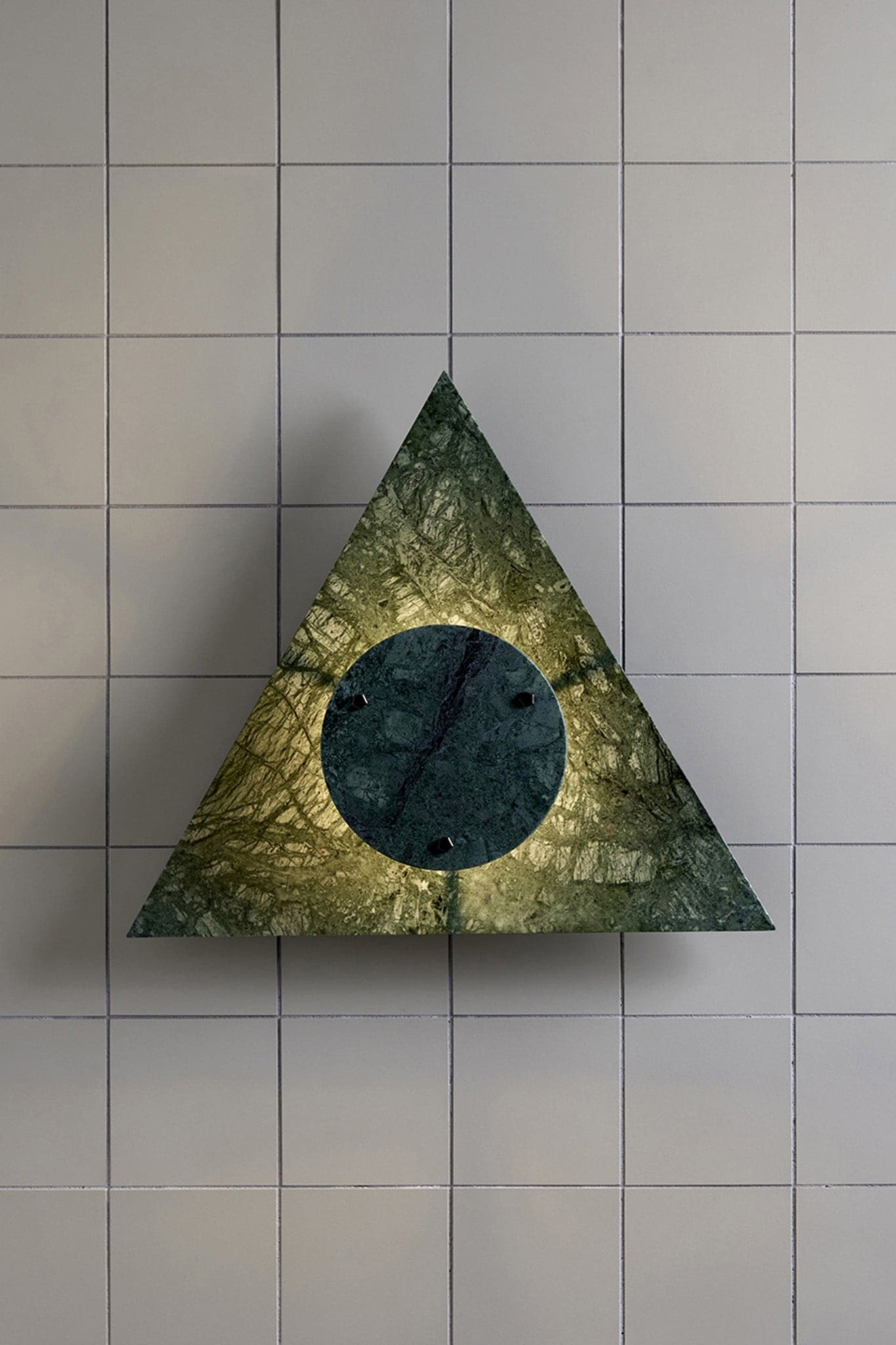 Marz Designs Feature Lighting - Bermuda Wall Light in Moss/Brushed Black with the light on.