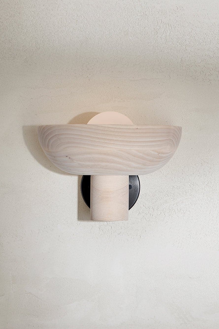 Marz Designs - Selene Uplight Large in Brushed Black/Bleached Ash with the light on.